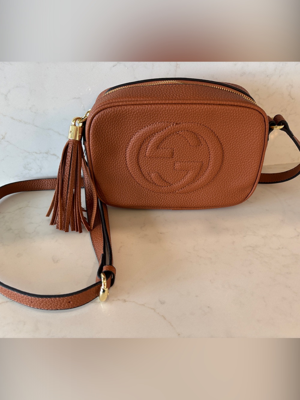 Designer Tan Pebbled Leather Crossbody with Tassel